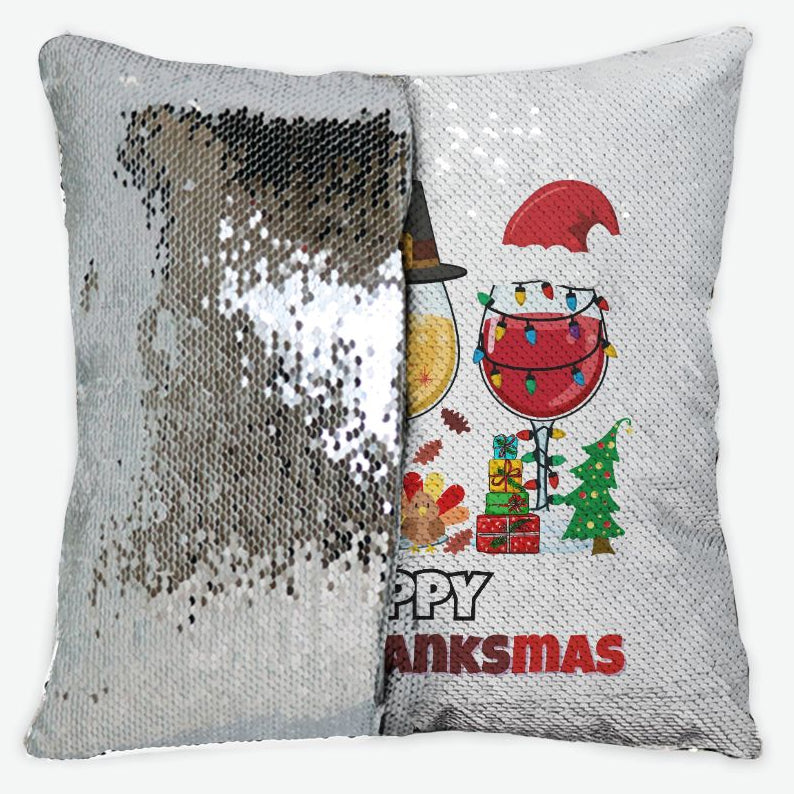Reversible Sequins Decorative pillow with silver sequin side and 'Happy Thanksmas' design on gray side.