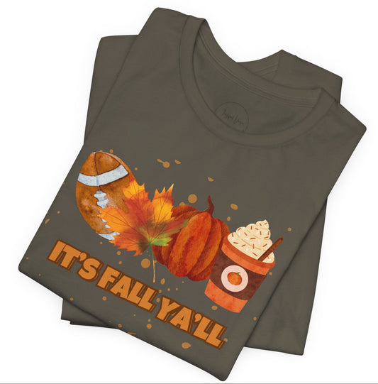Stack of gray t-shirts with autumn-themed design and 'It's Fall Y'all' text with a football, autumn leaf, a pumpkin & pumpkin spice latte graphics.