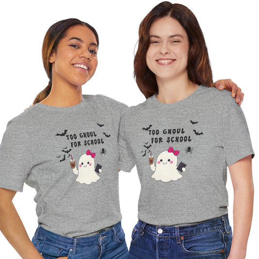 Two women wearing gray t-shirts with a ghost and text design on a white background