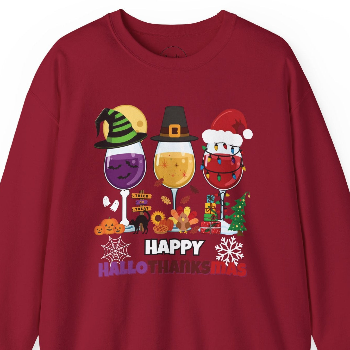 Red sweatshirt with festive design of wine glasses and holiday-themed elements on a white background