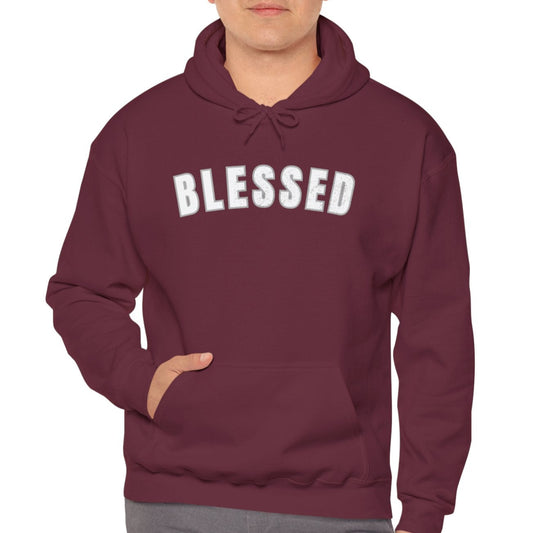 Man wearing a maroon hoodie with 'BLESSED' text on a white background