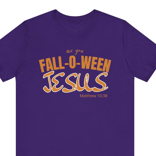 Purple t-shirt with 'Fall-O-Ween Jesus' text in orange and white on a white background
