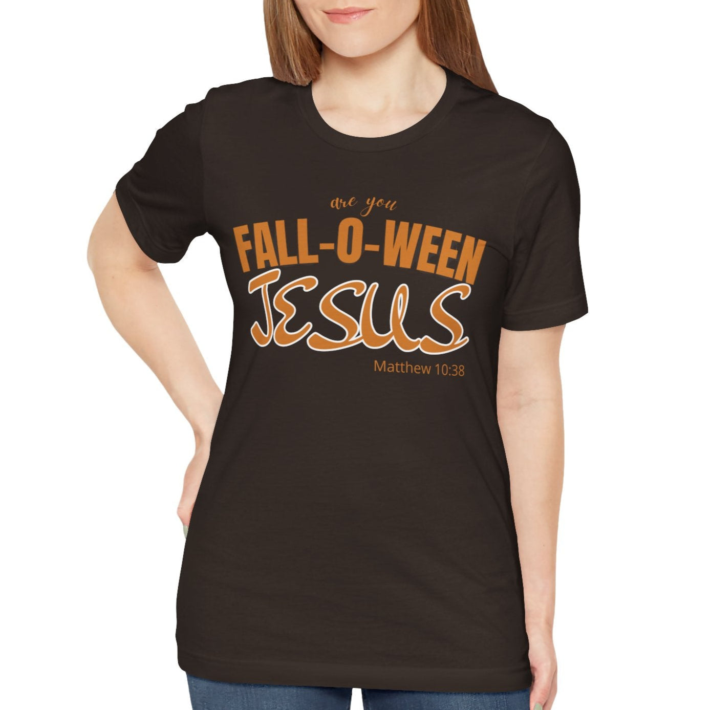 Woman wearing a black t-shirt with 'Are you Fall-O-Ween Jesus' text on a white background