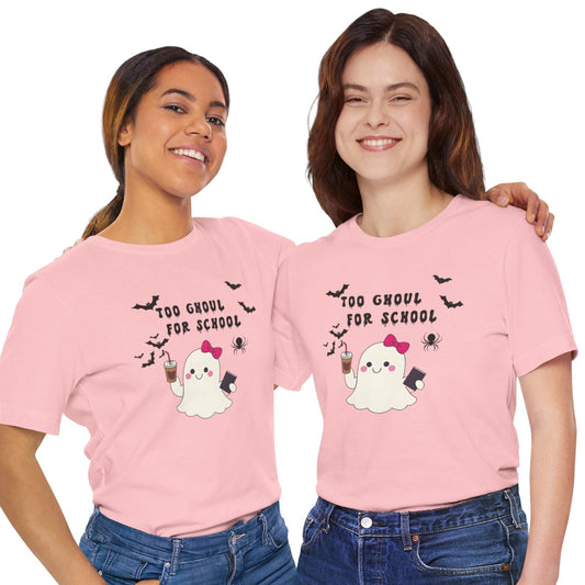 Two people wearing pink t-shirts with a ghost and text design on a white background