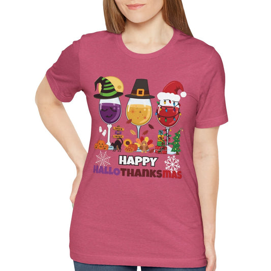 Woman wearing a pink t-shirt with festive design and text "Happy HallowThanksMas" on a white background