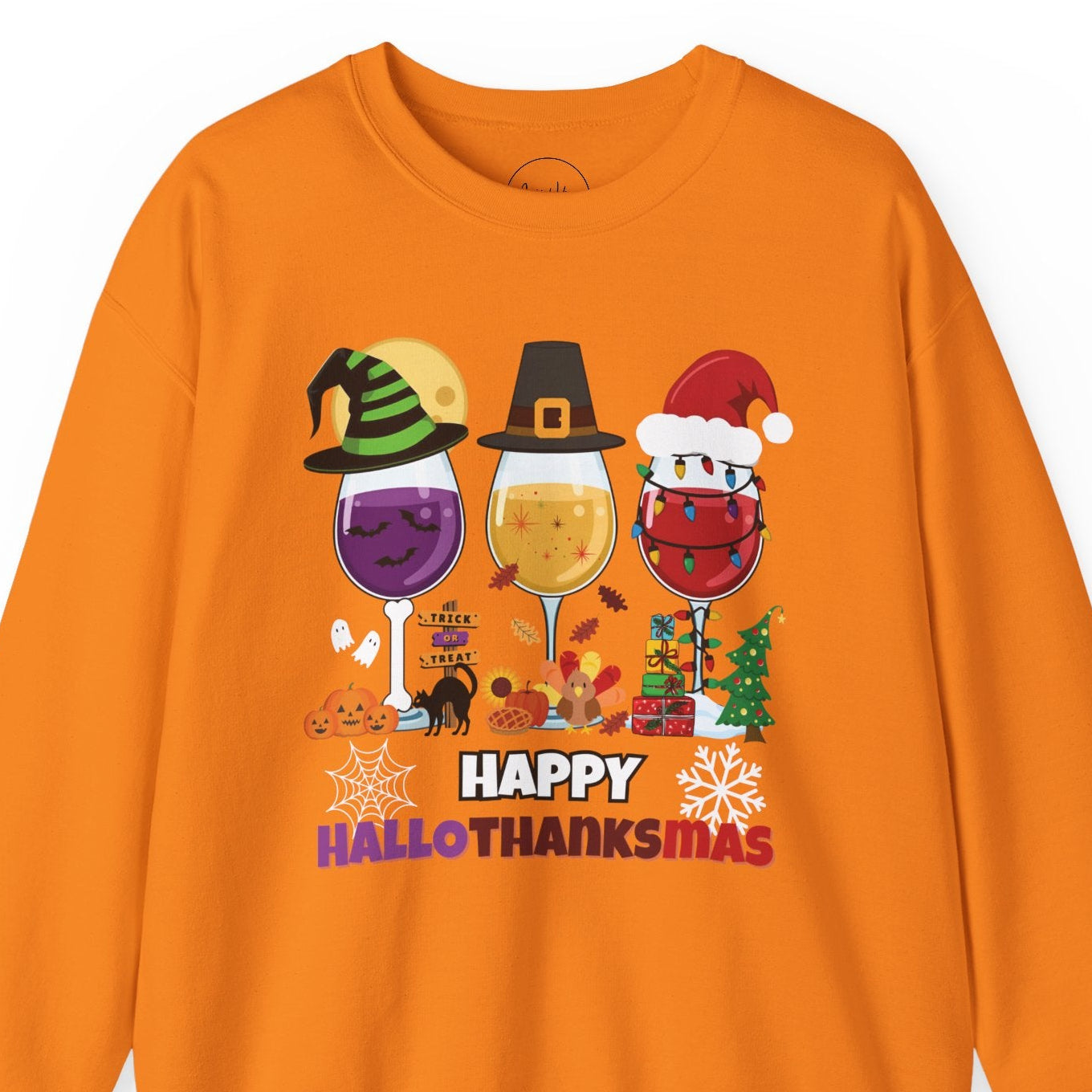 Orange sweatshirt with 'Happy Hallothanksmas' design featuring Halloween, Thanksgiving, and Christmas elements on a white background.
