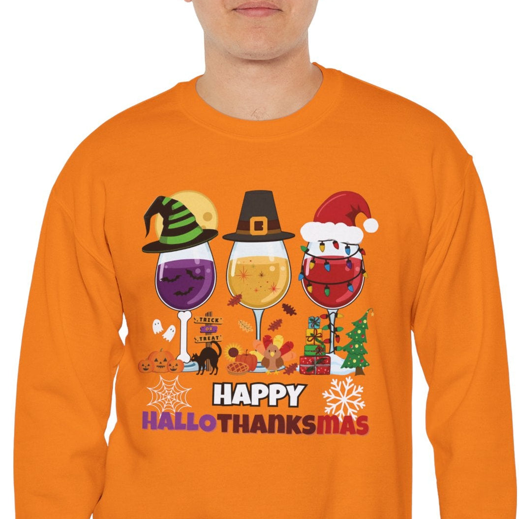 Man wearing an orange sweatshirt with 'Happy HalloThanksmas' design on a white background