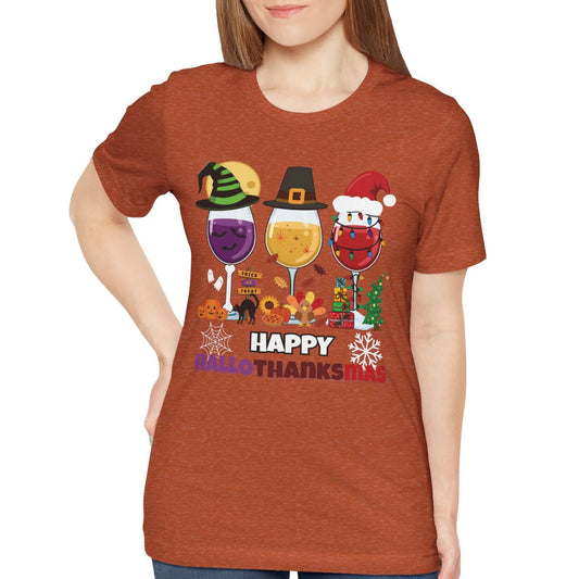 Person wearing a brown t-shirt with festive drink graphics and text Happy HallowThanksMas on a white background