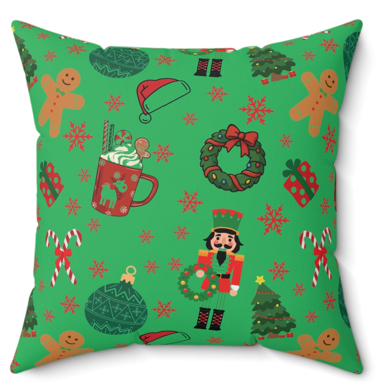 Green pillow with festive Christmas pattern on a white background