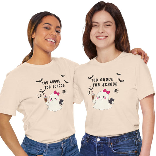Two people wearing matching Halloween-themed t-shirts with ghosts and text on a white background.