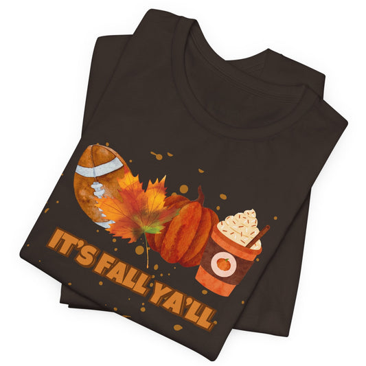 Folded brown t-shirt with autumn-themed design and 'It's Fall Y'all' text on a white background