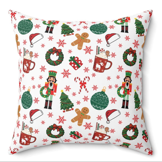 Decorative pillow with Christmas-themed pattern on a white background