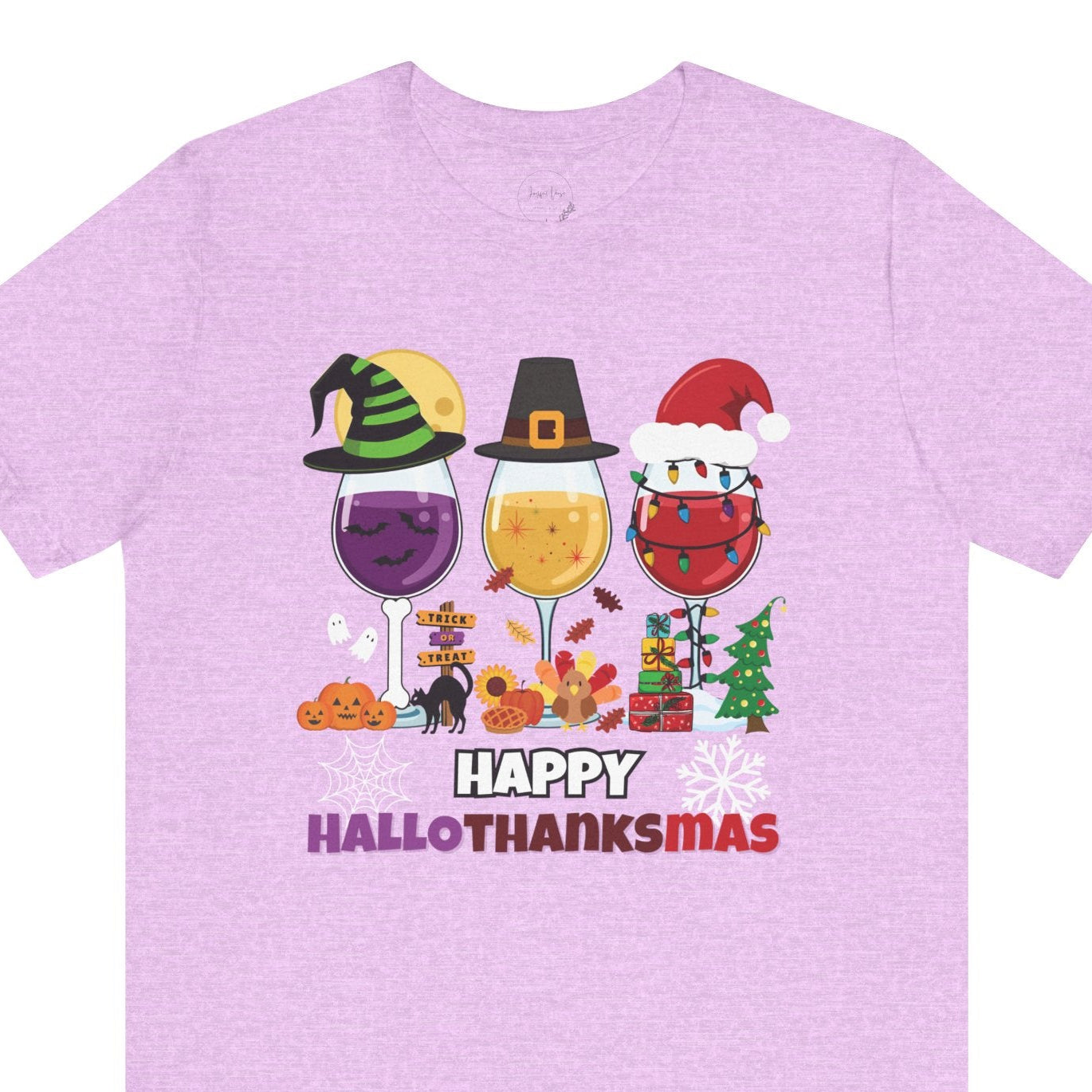 Light Purple t-shirt with 'Happy Hallothanksmas' design featuring Halloween and Thanksgiving elements on a white background.
