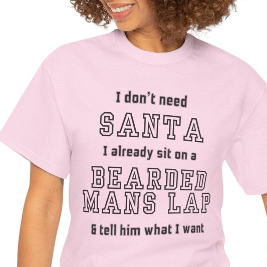 Person wearing a pink t-shirt with humorous text design on a white background