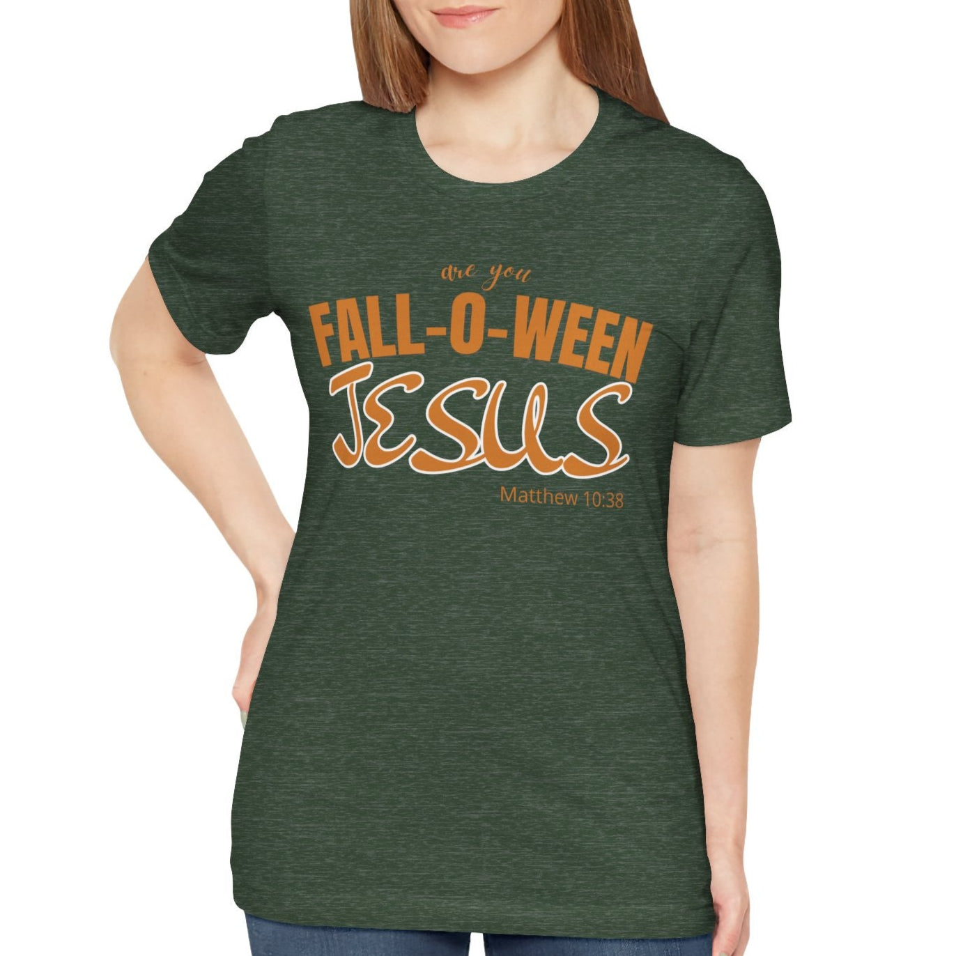 Woman wearing a green t-shirt with 'Fall-o-ween Jesus' text on a white background