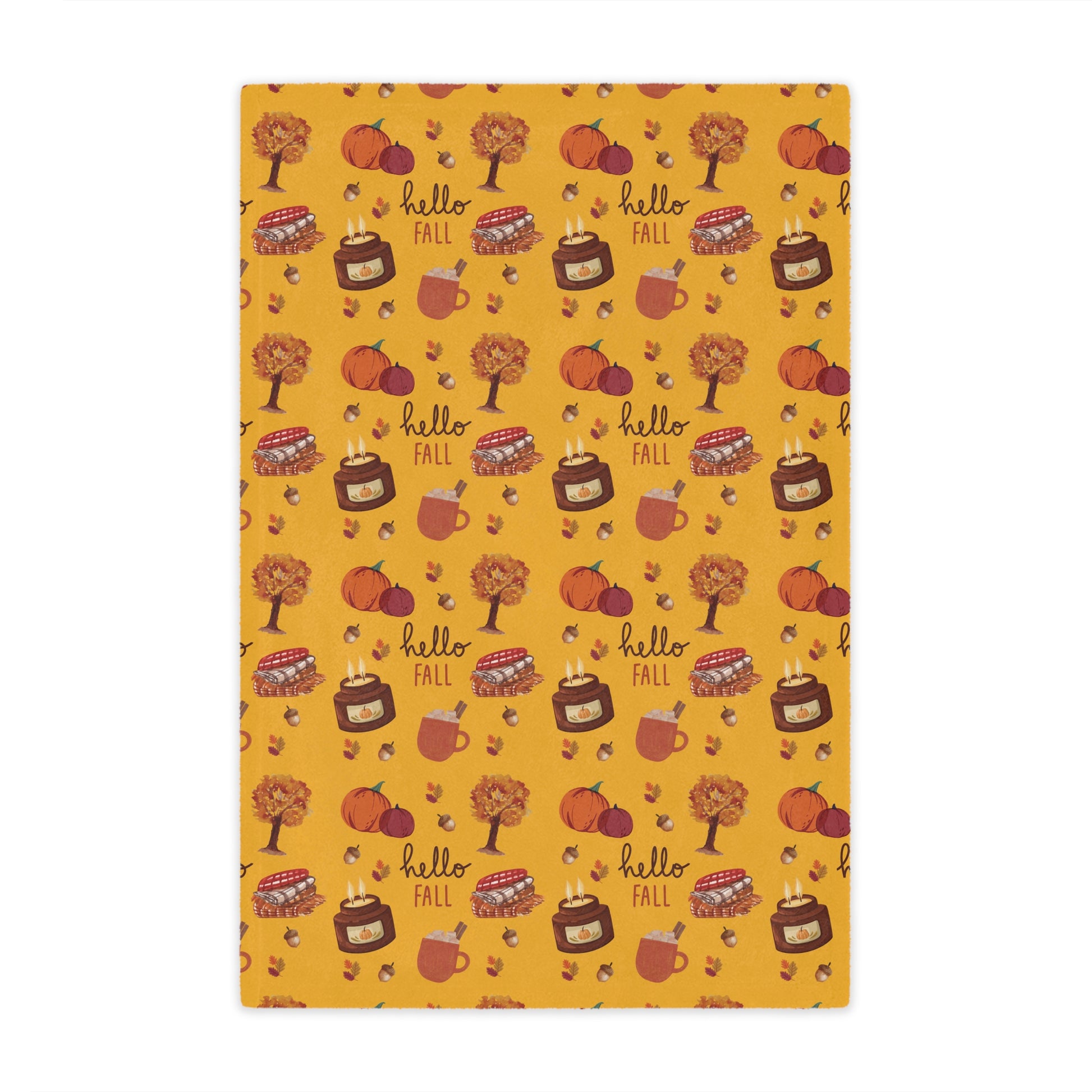 minky blanket with autumn-themed design featuring pumpkins, leaves, and 'hello fall' text on a yellow background.