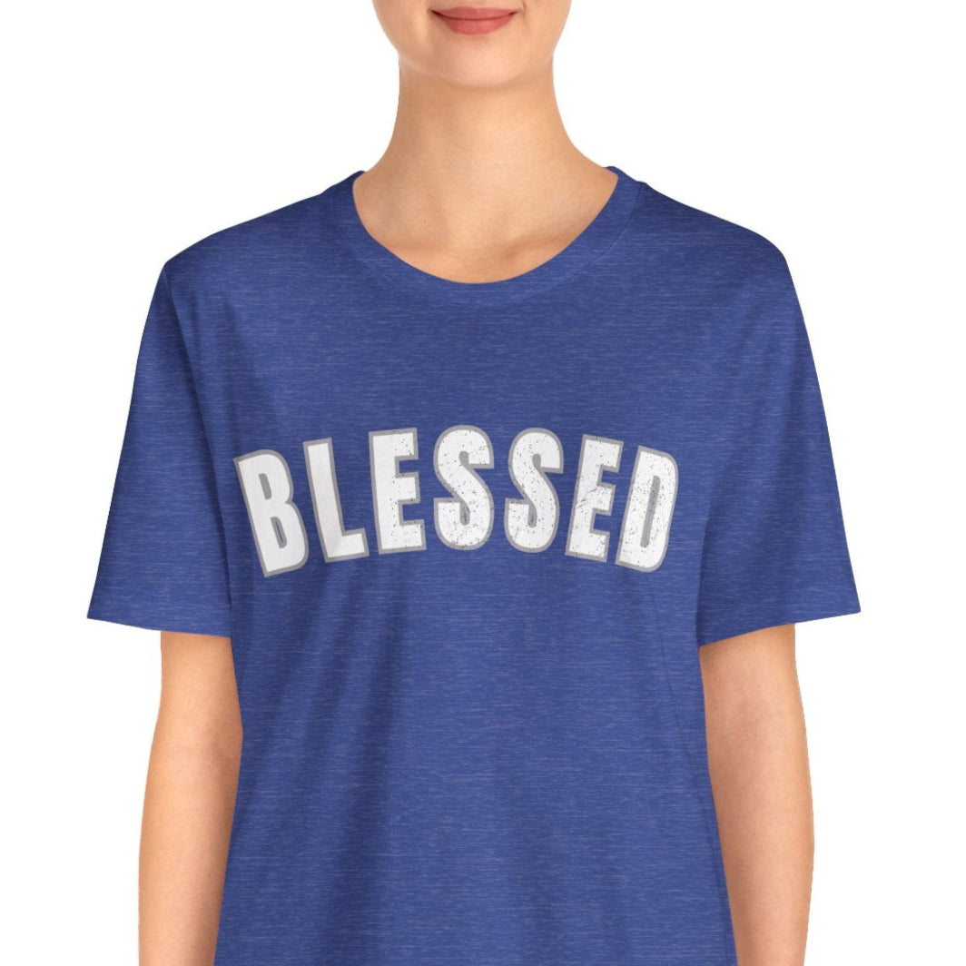 Person wearing a blue t-shirt with 'BLESSED' text on a white background