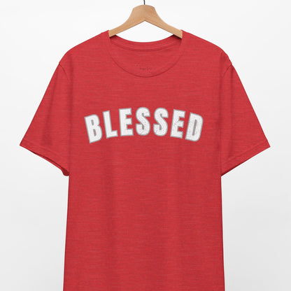Red t-shirt with 'BLESSED' text on a hanger against a white background