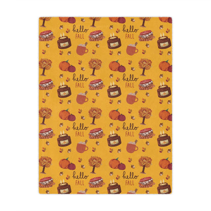 minky blanket with autumn-themed design featuring pumpkins, leaves, and 'hello fall' text on a yellow background.