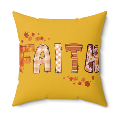 Yellow pillow with “FAITH” in fall patterns and autumn leaves, cozy seasonal home decor accent.
