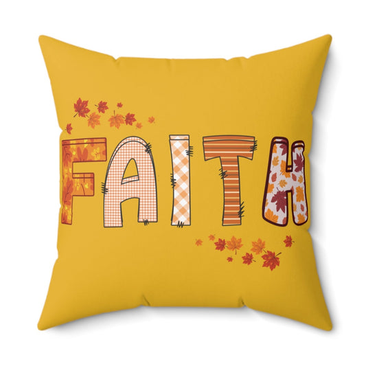 Yellow pillow with “FAITH” in fall patterns and autumn leaves, cozy seasonal home decor accent.