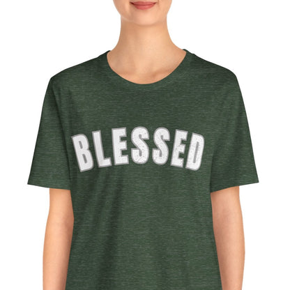 Person wearing a green t-shirt with 'BLESSED' text on a white background