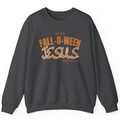 Dark gray sweatshirt with 'Fall-O-Ween Jesus' text in orange on a white background