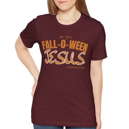 Woman wearing a maroon t-shirt with 'Fall-O-Ween Jesus' text on a white background