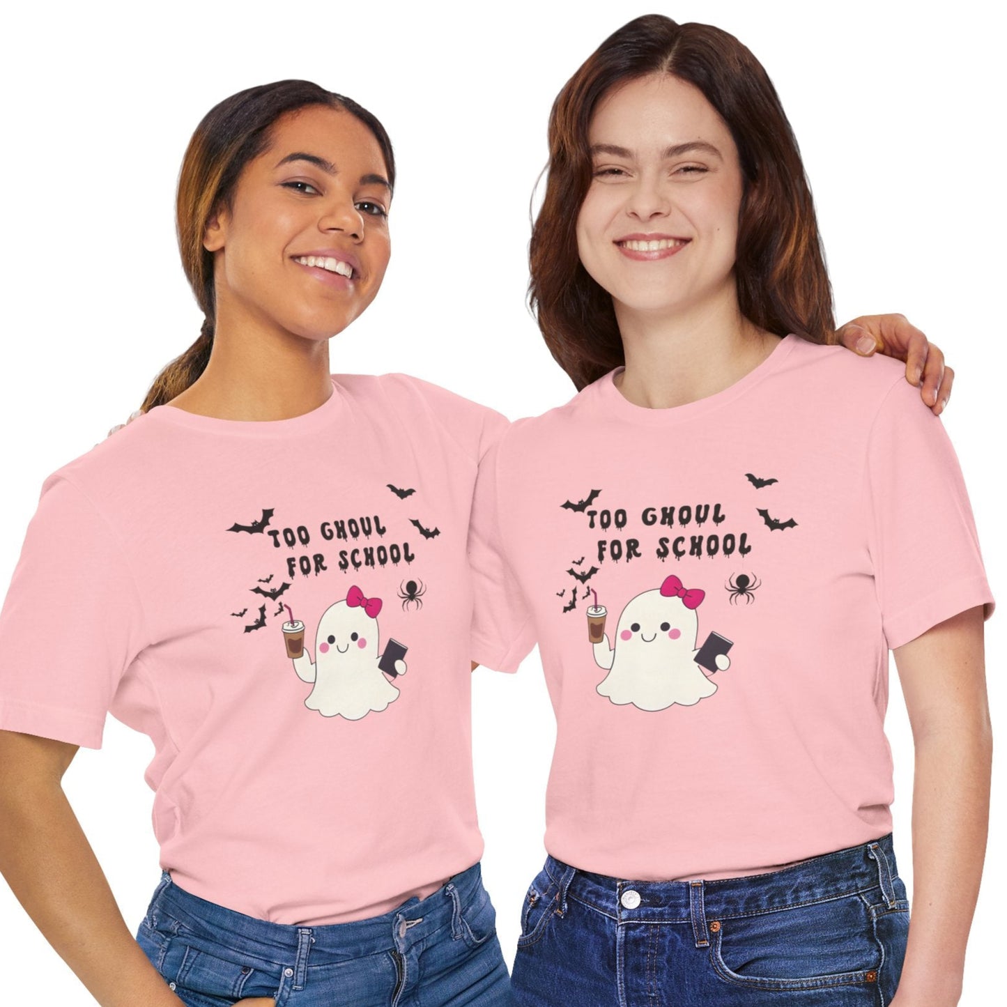 Two people wearing pink t-shirts with a ghost and text design on a white background