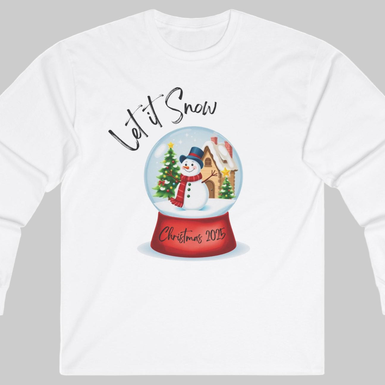 White long-sleeved tshirt with a snow globe design and 'Let it Snow' text on a white background