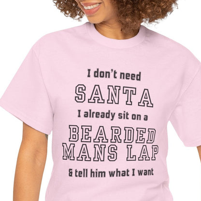 Person wearing a pink t-shirt with humorous text design on a white background