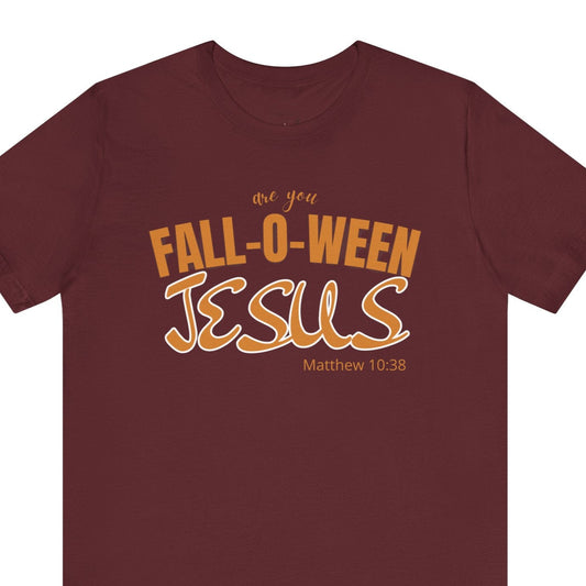 Maroon t-shirt with 'Fall-O-Ween Jesus' text in orange on a white background