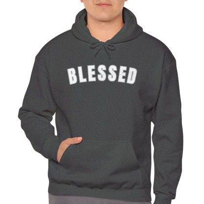Man wearing a gray hoodie with 'BLESSED' text on a white background