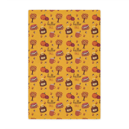 minky blanket with autumn-themed design featuring pumpkins, leaves, and 'hello fall' text on a yellow background.