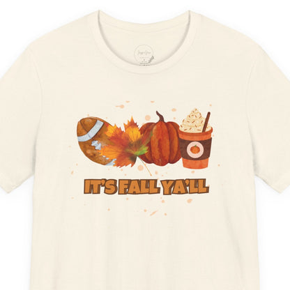 Beige t-shirt with autumn-themed graphics and text on a white background