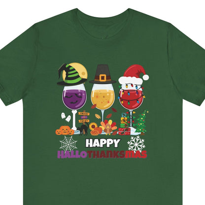Green t-shirt with 'Happy HalloThanksMas' design featuring wine glasses and holiday-themed graphics on a white background.
