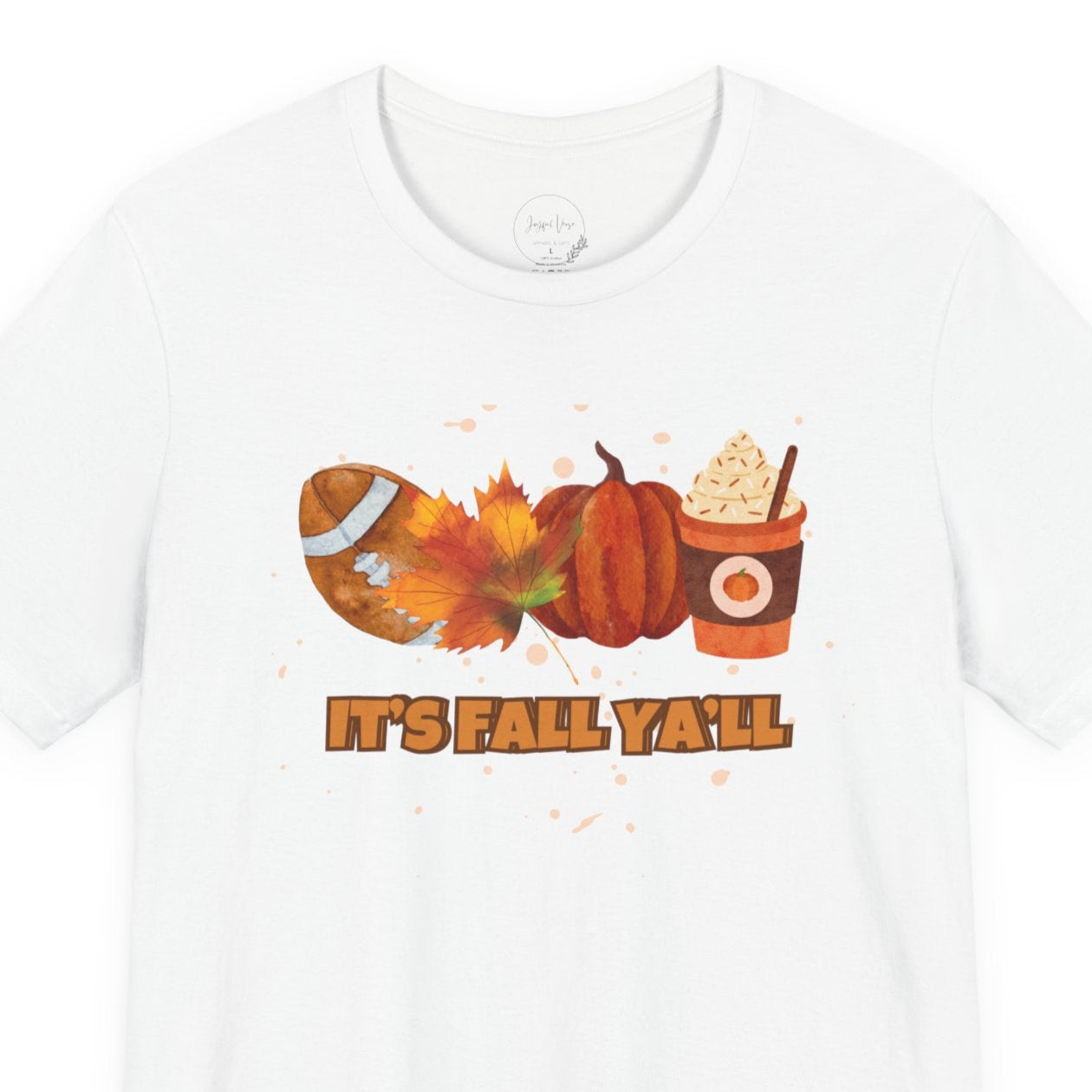 White t-shirt with autumn-themed graphics and text on a white background