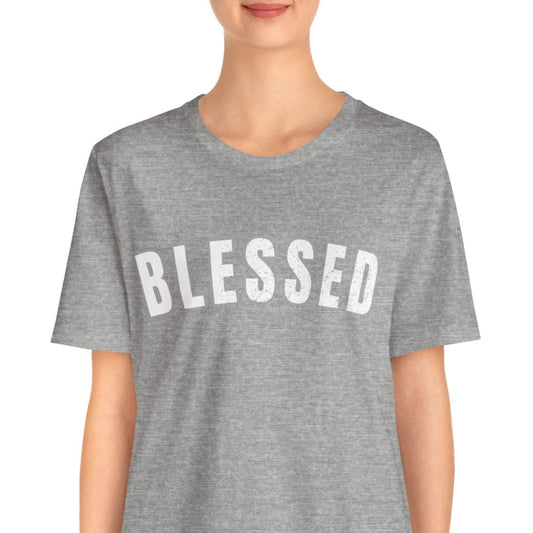 Person wearing a gray t-shirt with 'BLESSED' text on a white background